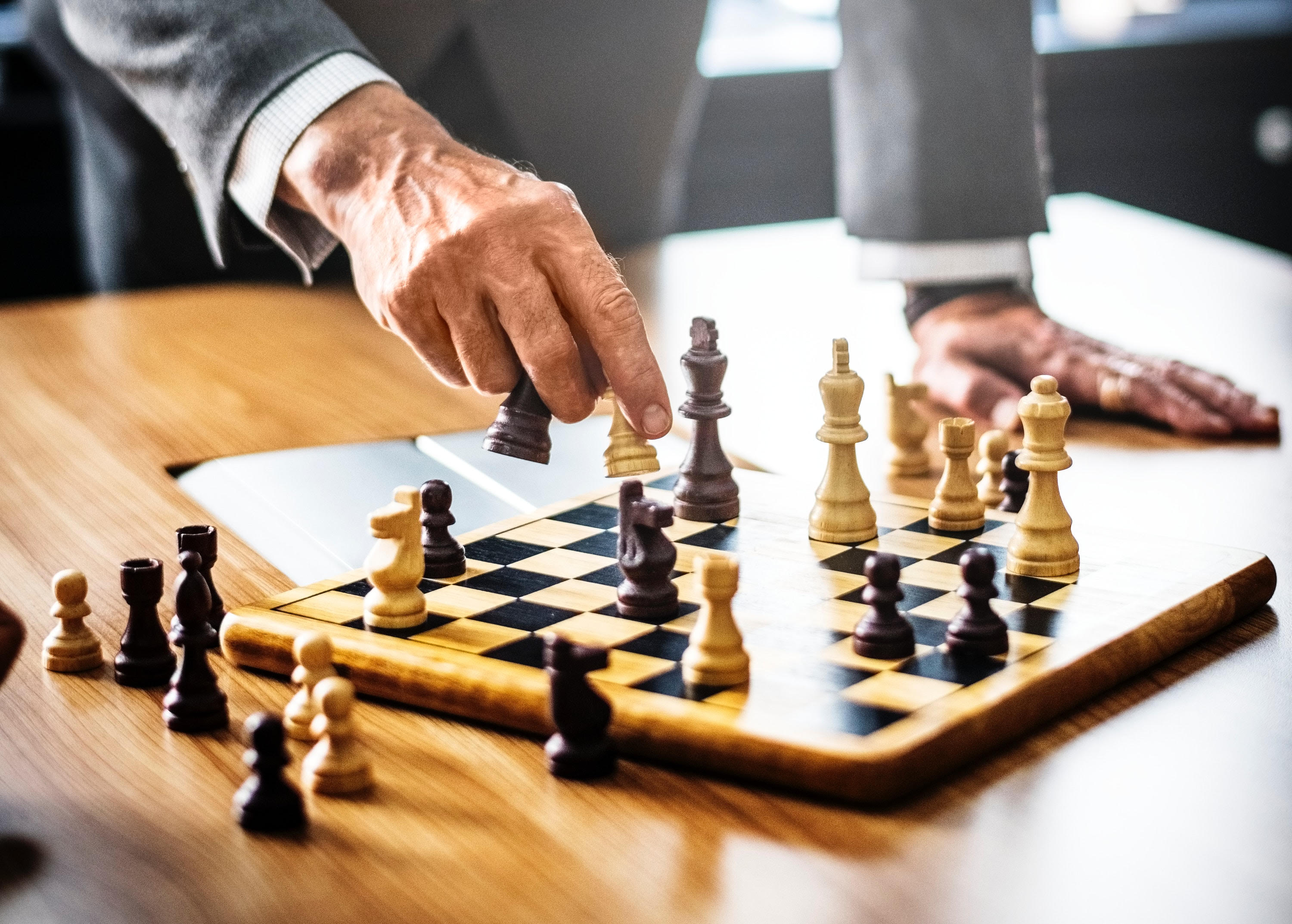 Choosing law firm marketing spend strategy like playing chess
